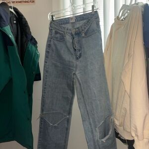 Women's Light Blue Distressed Jeans